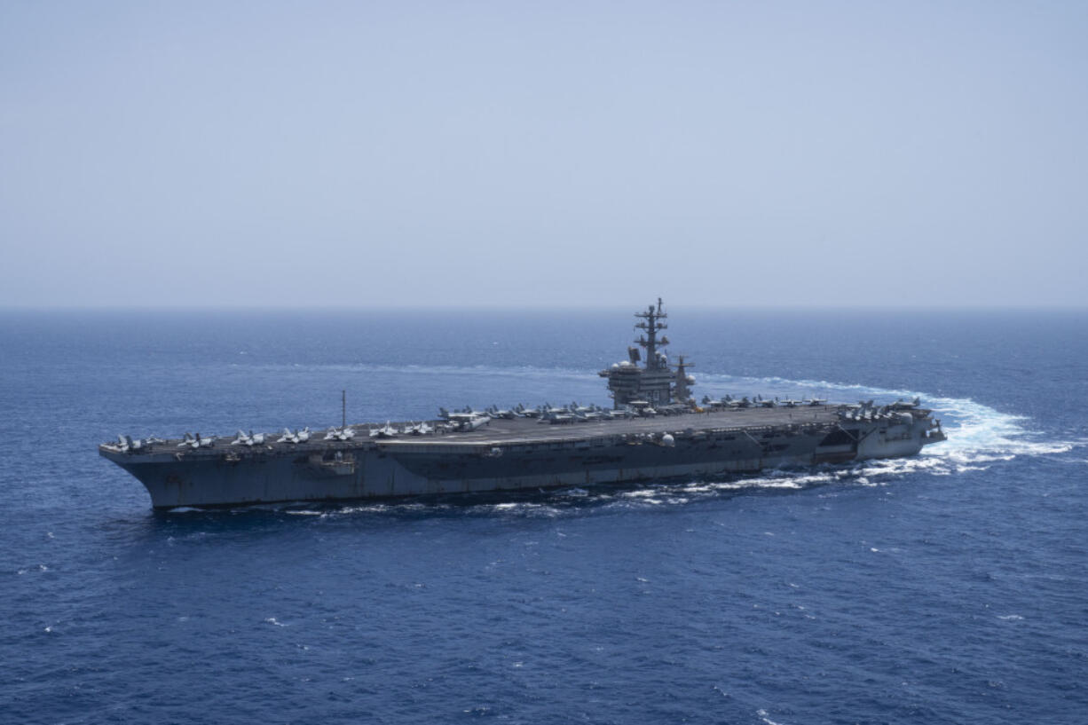 FILE - The USS aircraft carrier Dwight D. Eisenhower, also known as &lsquo;IKE&rsquo;, sails in the Red Sea on Wednesday, June 12, 2024.