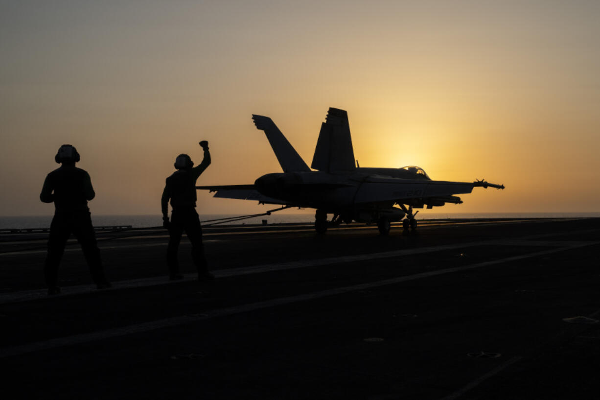 A fighter jet lands on the USS Dwight D. Eisenhower, also known as &ldquo;IKE,&rdquo; in the Red Sea on Tuesday, June 11, 2024. The U.S.-led campaign against Iran-backed Houthi rebels has turned into the most intense running sea battle the Navy has faced since World War II. That&rsquo;s what its leaders and experts tell The Associated Press, whose journalists visited U.S. ships off Yemen in recent days.