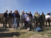 FILE - Texas Gov. Greg Abbott, center, is joined by fellow governors during a news conference along the Rio Grande to discuss Operation Lone Star and border concerns, Sunday, Feb. 4, 2024, in Eagle Pass, Texas. Louisiana lawmakers approved a bill Wednesday that would empower state and local law enforcement to arrest and jail people in the state who entered the U.S.