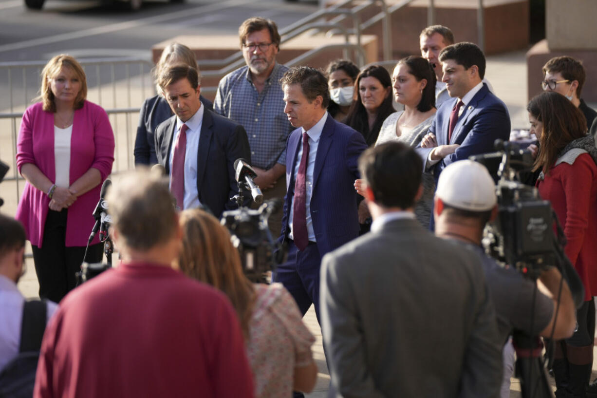 FILE - The lawyers representing the families of the victims of the shooting at Sandy Hook Elementary speak to the media in Waterbury, Conn, Oct. 12, 2022. A U.S. bankruptcy court trustee is planning to shut down conspiracy theorist Alex Jones&#039; Infowars media platform and liquidate its assets to help pay the $1.5 billion in lawsuit judgments Jones owes for repeatedly calling the 2012 Sandy Hook Elementary School shooting a hoax.