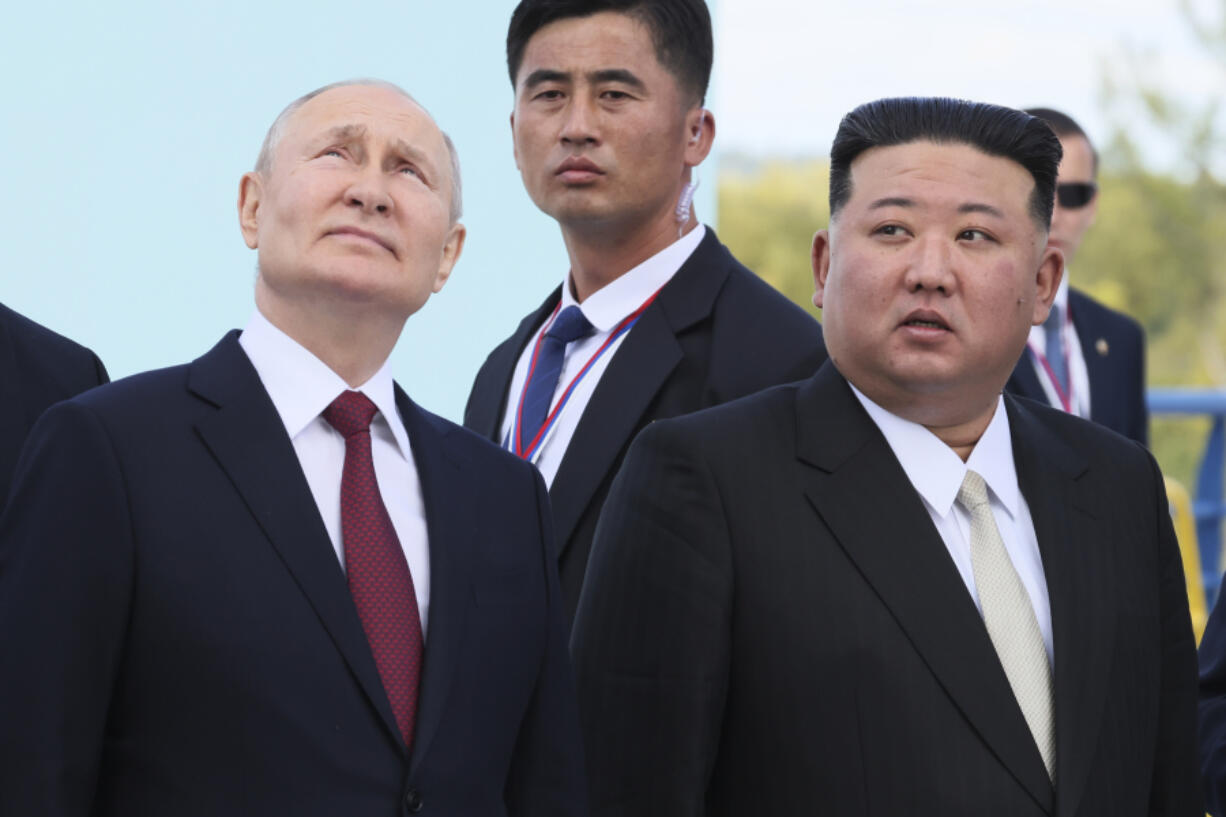 FILE - Russian President Vladimir Putin, left, and North Korea&rsquo;s leader Kim Jong Un examine a launch pad of Soyuz rockets during their meeting at the Vostochny cosmodrome outside the city of Tsiolkovsky, about 200 kilometers (125 miles) from the city of Blagoveshchensk in the far eastern Amur region, Russia, on Wednesday, Sept. 13, 2023.