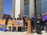 FILE - Attorney Gail Evans, of the Center for Biological Diversity&rsquo;s Climate Law Institute, speaks about pollution from oil and natural gas development and frustration with state oversight of the industry outside the state First District Court in Santa Fe, N.M., May 10, 2023. On Monday, June 10, 2024, a New Mexico judge cleared the way for a landmark lawsuit to proceed that alleges the state has failed to meet its constitutional obligations for protecting against oil and gas pollution. Environmental groups and Native Americans who live near oil wells in the No. 2 producing state in the U.S. initially filed the case in 2023.