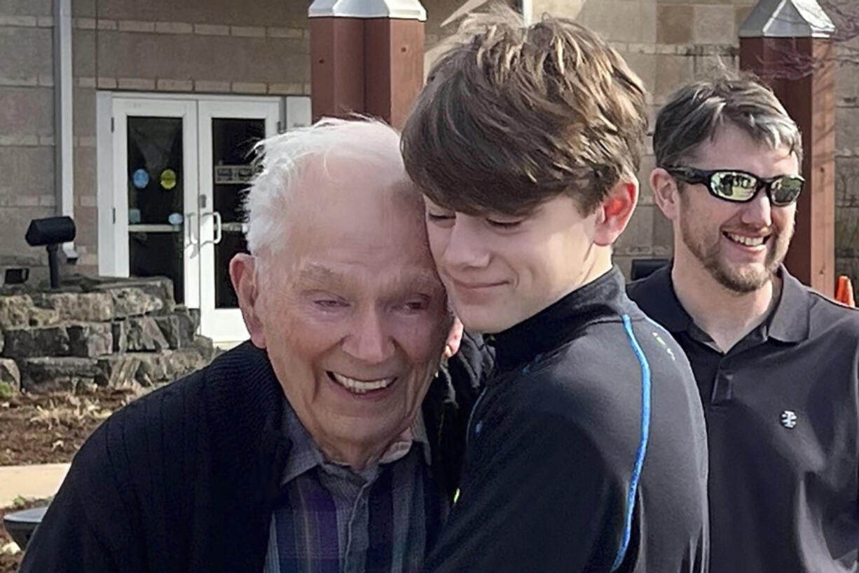 This photo provided by Linda Mitchelle shows Orville Allen of Poplar Bluff, Mo., hugging his great-grandson in March 2024. Allen died Wednesday, May 29, 2024, and his liver was successfully donated and transplanted to a 72-year-old woman. Transplant organizations say Allen is the oldest American ever to donate an organ upon death.