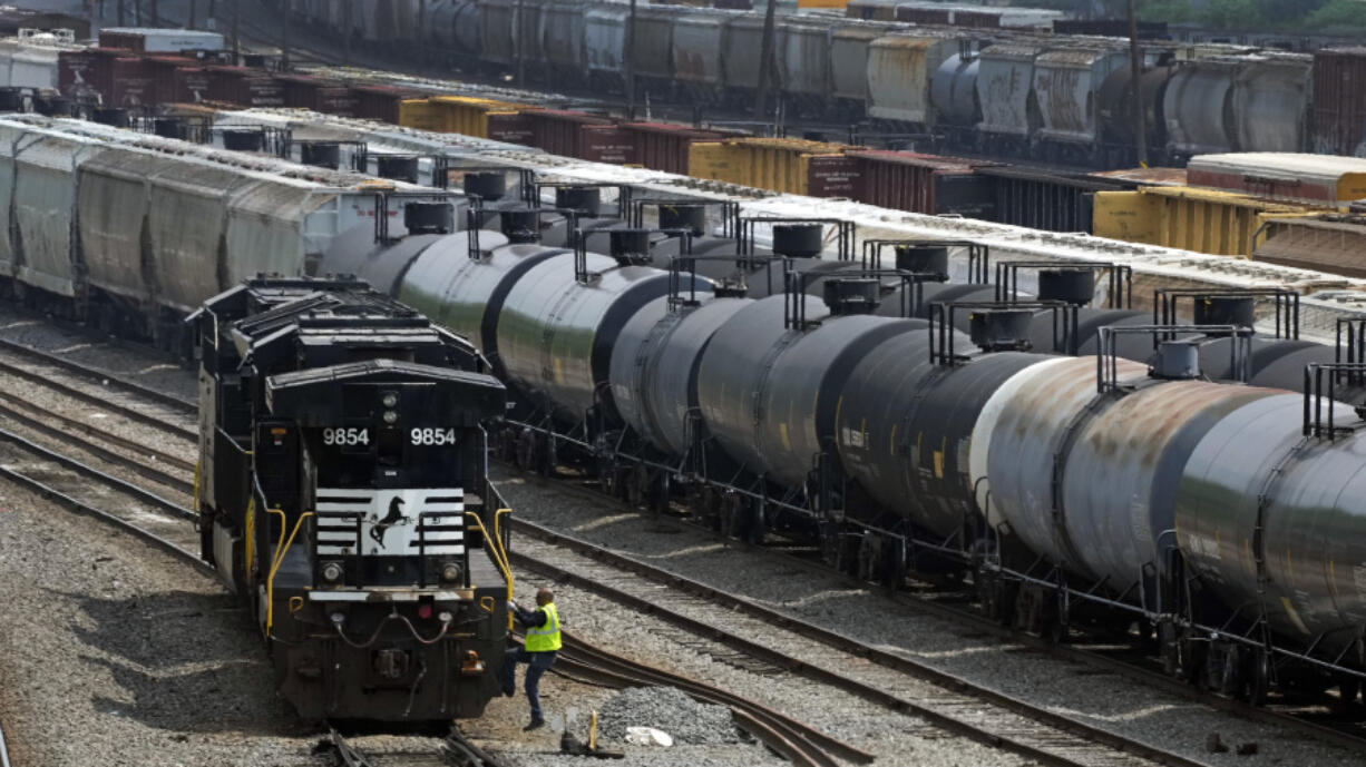 FILE - Norfolk Southern locomotives are moved in Norfolk Southern&rsquo;s Conway Terminal, June 17, 2023, in Conway, Pa. The goal of a new federal rule finalized Monday, June 24, 2024 is ensuring first responders can find out what hazardous chemicals are on a train almost immediately after a derailment, so they can respond appropriately.  (AP Photo/Gene J.