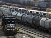 FILE - Norfolk Southern locomotives are moved in Norfolk Southern&rsquo;s Conway Terminal, June 17, 2023, in Conway, Pa. The goal of a new federal rule finalized Monday, June 24, 2024 is ensuring first responders can find out what hazardous chemicals are on a train almost immediately after a derailment, so they can respond appropriately.  (AP Photo/Gene J.