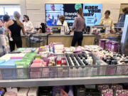 FILE - Purchases are made in a retail store in Northbrook, Ill., Monday, May 13, 2024. On Tuesday, June 18, 2024, the Commerce Department releases U.S. retail sales data for May. (AP Photo/Nam Y.