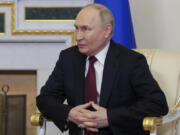 Russia&rsquo;s President Vladimir Putin listens to Bolivia&rsquo;s President Luis Arce during their talks on the sidelines of the St. Petersburg International Economic Forum in St. Petersburg, Russia, Thursday, June 6, 2024.