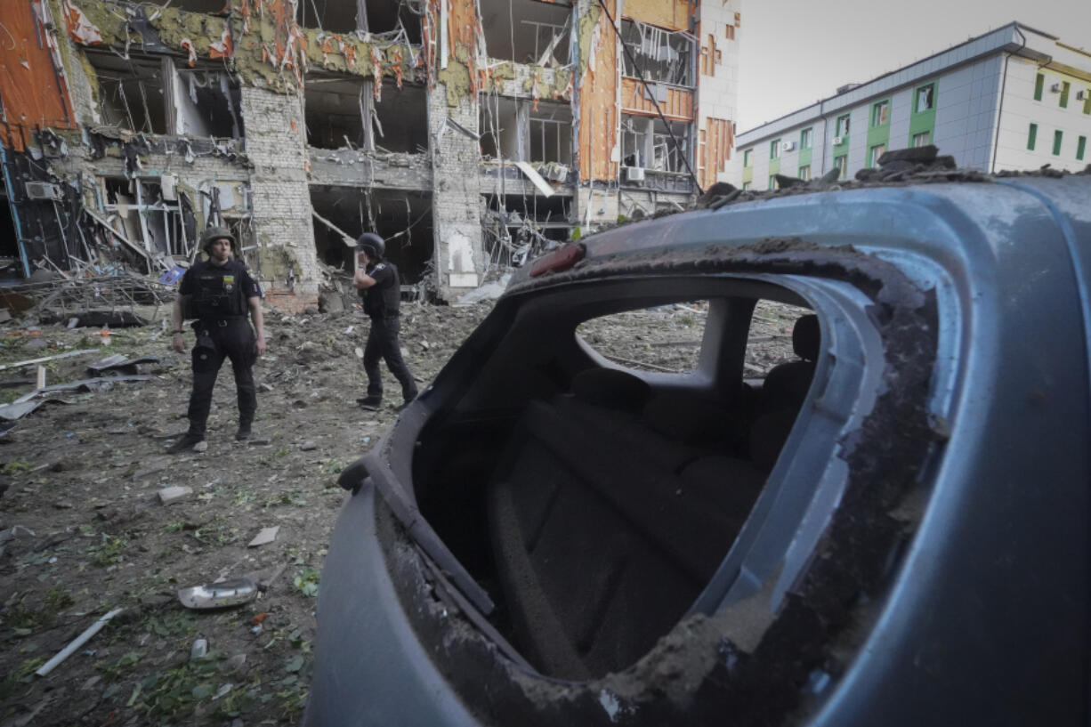 The city center is covered with debris after the Russian missile attack in Kharkiv, Ukraine, Saturday, May, 25, 2024.