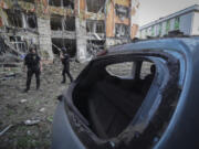 The city center is covered with debris after the Russian missile attack in Kharkiv, Ukraine, Saturday, May, 25, 2024.