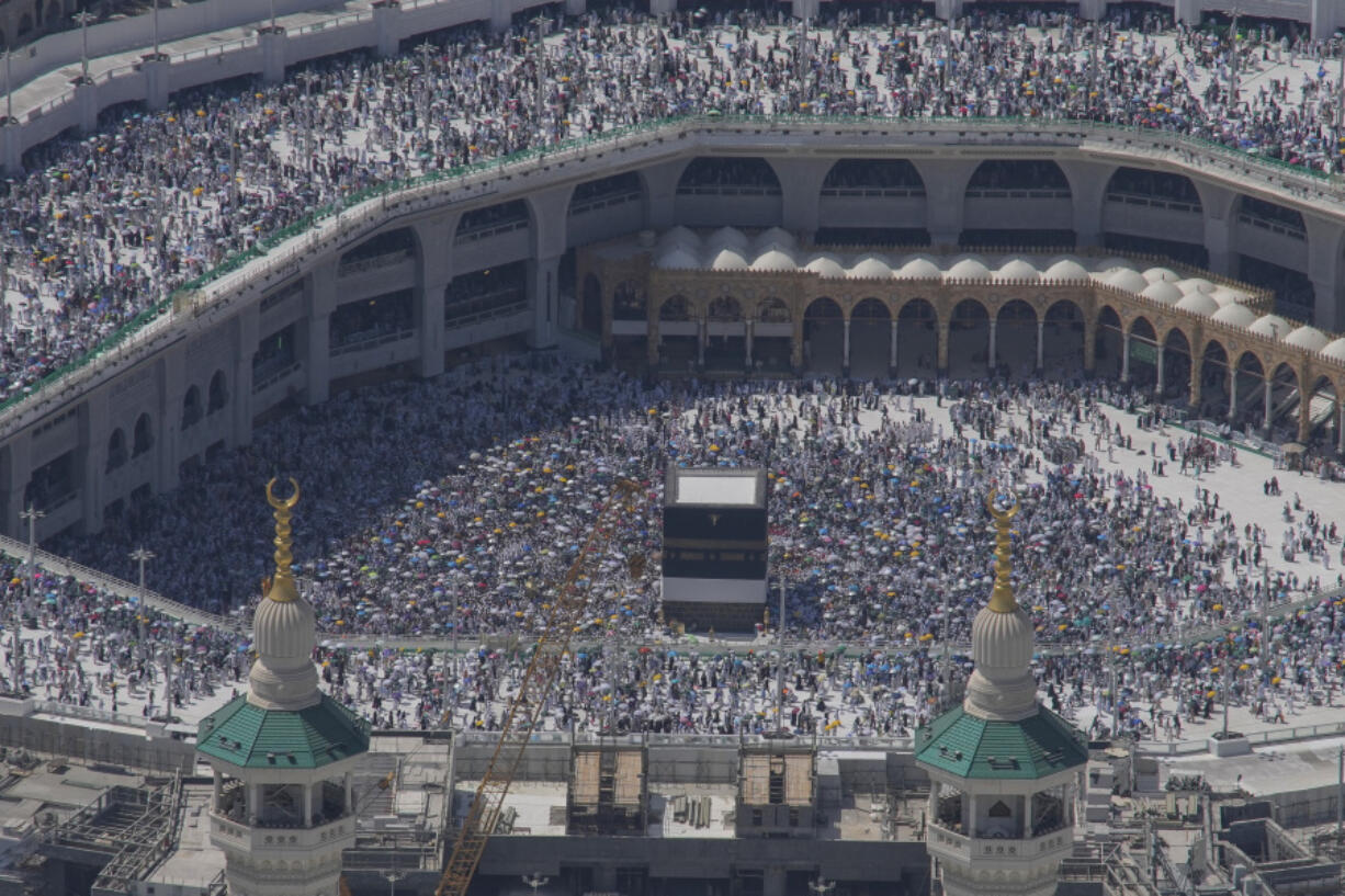 FILE - Muslim pilgrims circumambulate the Kaaba, the cubic building at the Grand Mosque, during the annual Hajj pilgrimage in Mecca, Saudi Arabia, Monday, June 17, 2024. More than 1,000 people died during this year&rsquo;s Hajj pilgrimage in Saudi Arabia as the faithful faced extreme high temperatures at Islamic holy sites in the desert kingdom, officials said Sunday, June 23, 2024.