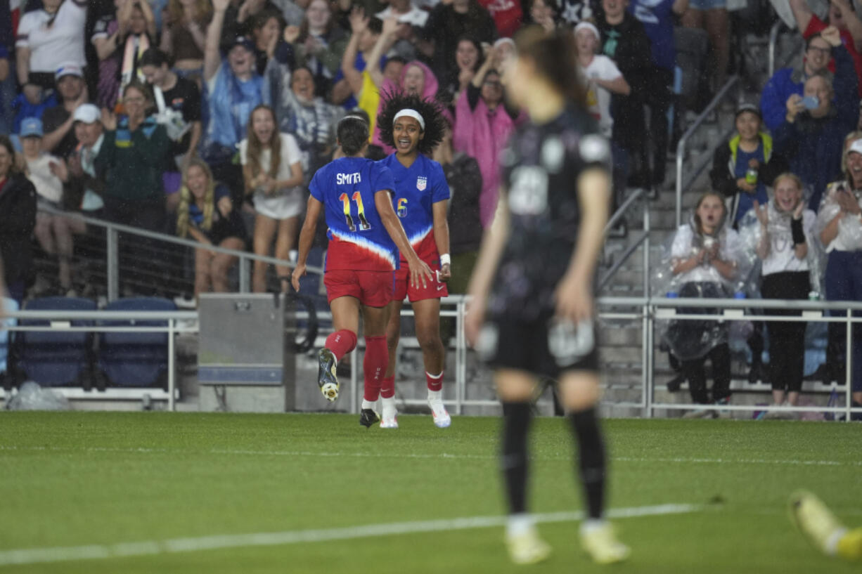 United States midfielder Lily Yohannes (6) celebrates with forward Sophia Smith (11) after scoring during the second half of an international friendly soccer match against South Korea in St. Paul, Minn., Tuesday, June 4, 2024.