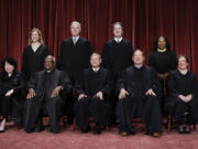 FILE - Members of the Supreme Court sit for a new group portrait following the addition of Associate Justice Ketanji Brown Jackson, at the Supreme Court building in Washington, Oct. 7, 2022. Bottom row, from left, Associate Justice Sonia Sotomayor, Associate Justice Clarence Thomas, Chief Justice of the United States John Roberts, Associate Justice Samuel Alito, and Associate Justice Elena Kagan. Top row, from left, Associate Justice Amy Coney Barrett, Associate Justice Neil Gorsuch, Associate Justice Brett Kavanaugh, and Associate Justice Ketanji Brown Jackson. (AP Photo/J.