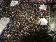 Supporters of the ruling Democratic Progressive Party (DPP) gather and push an ball reading &#039;&#039;Reject China&#039;s Interference In Politics&#039;&#039; outside of the legislative building in Taipei, Taiwan, Tuesday, May 28, 2024.