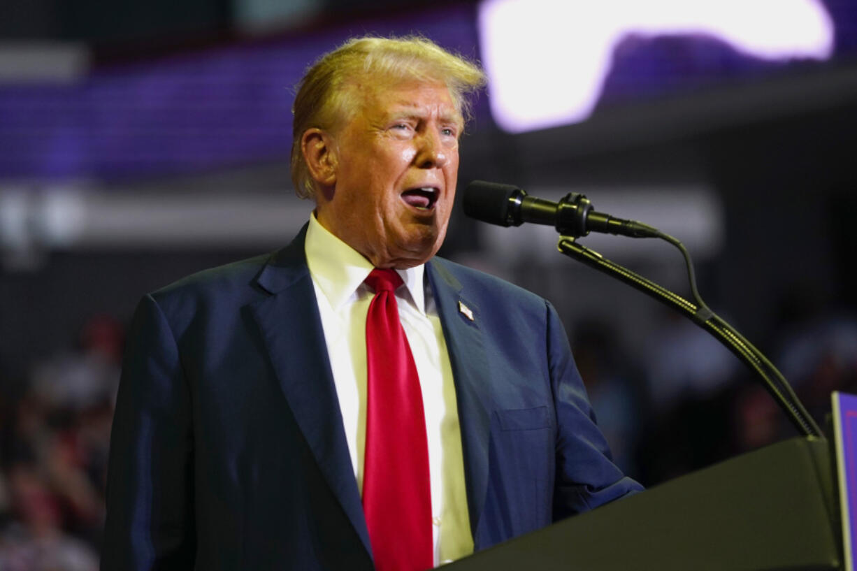 FILE - Republican presidential candidate former President Donald Trump speaks at a campaign rally, June 22, 2024, at Temple University in Philadelphia. The federal judge presiding over Trump&#039;s classified documents prosecution is hearing arguments Monday, June 24, on whether to bar him from public comments that prosecutors say could endanger the lives of FBI agents working on the case. Special counsel Jack Smith&#039;s team says the restrictions are necessary in light of Trump&#039;s false comments that the FBI agents who searched his Mar-a-Lago estate for classified documents were out to kill him and his family.