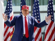 FILE - Republican presidential candidate former President Donald Trump enters at a campaign event, June 18, 2024, in Racine, Wis. Manhattan prosecutors are urging the judge overseeing Donald Trump&rsquo;s criminal hush money case to uphold a gag order that bars the Republican former president from criticizing jurors, court staff, or members of the prosecution that convicted him.