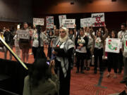 Safa Peera, of Seattle, speaks at the Washington State Democrats convention on Sunday, June 23, 2024, in Bellevue, Washington. State Democrats passed three resolutions concerning the war in Gaza, including a call for a ceasefire.