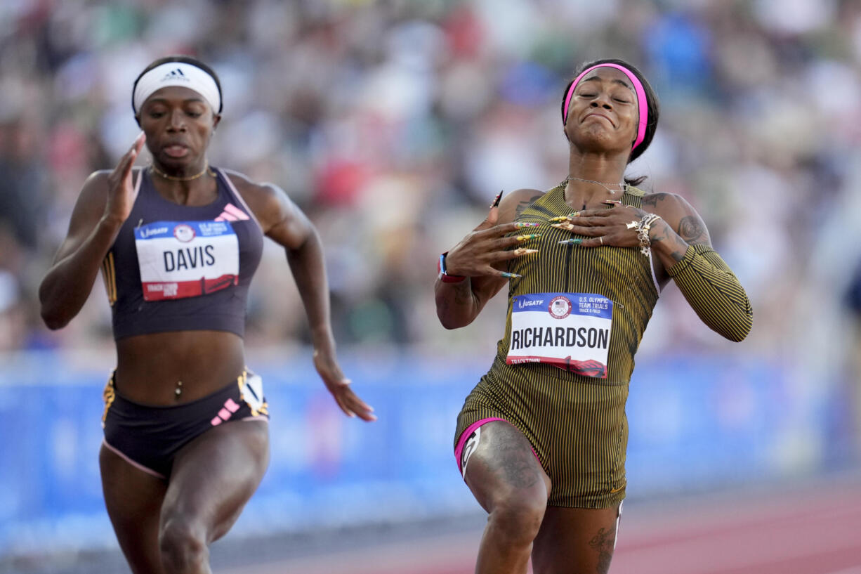 Sha'Carri Richardson celebrates her win in the wins women's 100-meter run final during the U.S. Track and Field Olympic Team Trials Saturday, June 22, 2024, in Eugene, Ore.