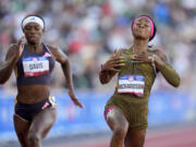 Sha'Carri Richardson celebrates her win in the wins women's 100-meter run final during the U.S. Track and Field Olympic Team Trials Saturday, June 22, 2024, in Eugene, Ore.