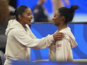 Simone Biles and Jordan Chiles speak between events at the United States Gymnastics Olympic Trials on Friday, June 28, 2024, in Minneapolis.