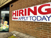 FILE - A hiring sign is displayed in Riverwoods, Ill., on April 16, 2024. On Thursday, June 27, 2024, the government reports on the number of Americans who applied for unemployment benefits last week. (AP Photo/Nam Y.