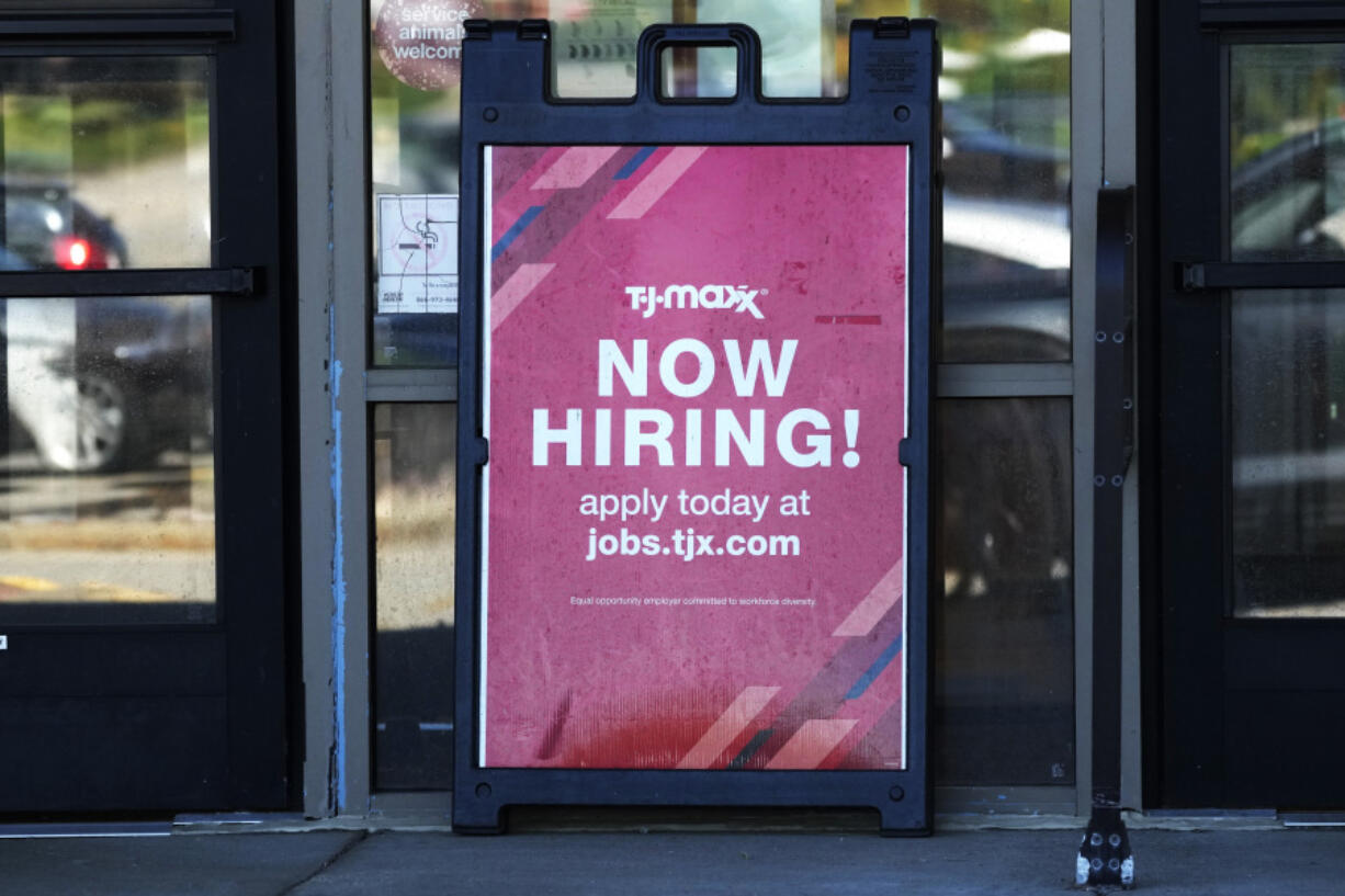 A hiring sign is displayed at a retail store in Vernon Hills, Ill., Tuesday, May 28, 2024. On Thursday, May 30, 2024, the Labor Department reports on the number of people who applied for unemployment benefits last week. (AP Photo/Nam Y.