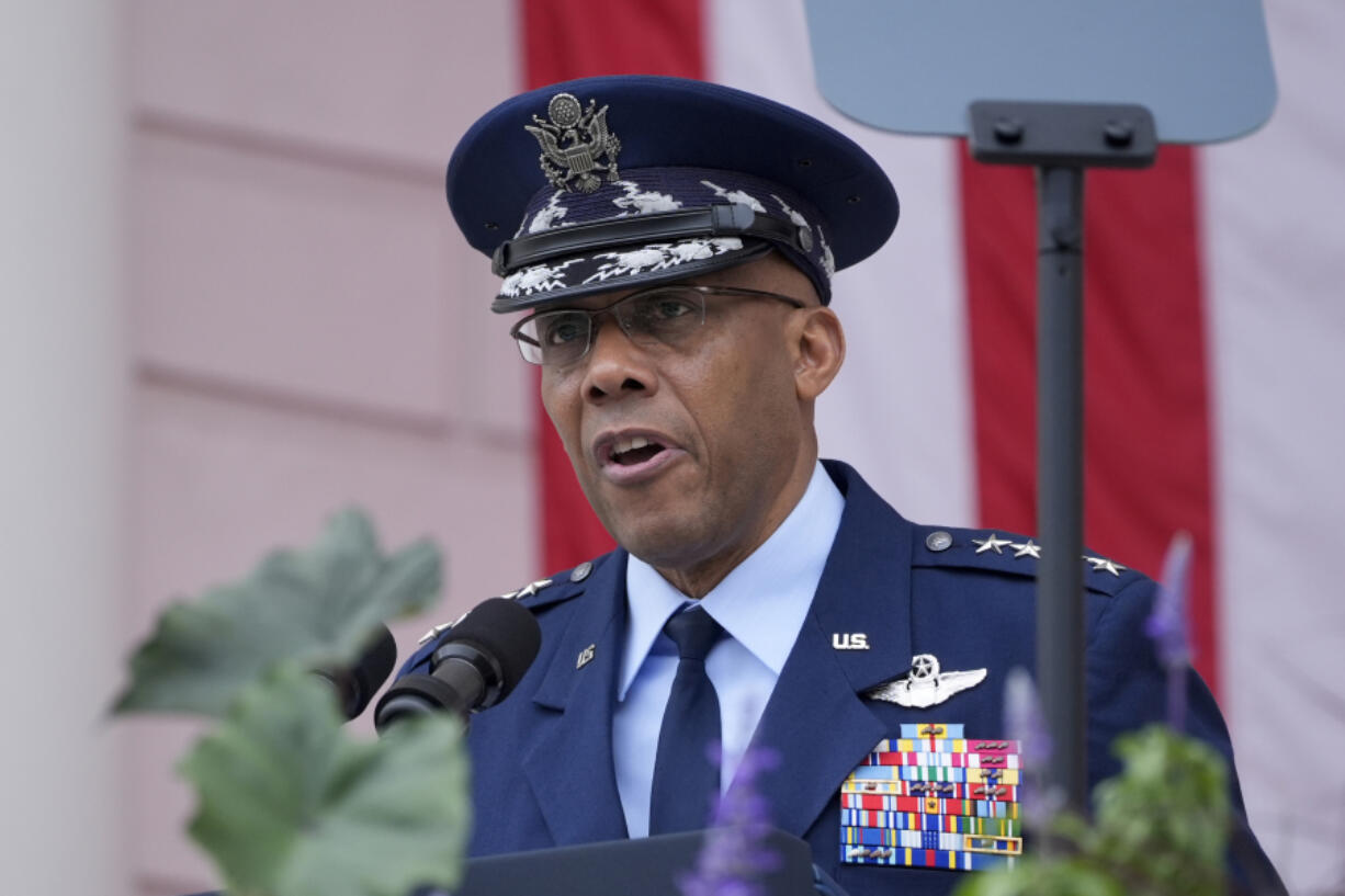 FILE - Chairman of the Joint Chiefs of Staff Air Force Gen. CQ Brown speaks at the 156th National Memorial Day Observance in the Memorial Amphitheater at Arlington National Cemetery in Arlington, Va., Monday, May 27, 2024. The forced U.S. troop withdrawals from bases in Niger and Chad and the potential to shift some troops to other nations in West Africa will be key issues as the top U.S. military officer meets with his counterparts this week at a chiefs of defense conference. Gen. CQ Brown, chairman of the Joint Chiefs of Staff, arrived in Botswana Monday, June 24, 2024, as the U.S. faces a critical inflection point in Africa.