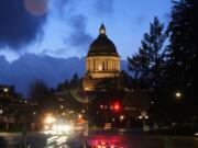 FILE - The Washington state Capitol building is pictured, Tuesday, Jan. 9, 2024, in Olympia, Wash. A new Washington state parental rights law derided by critics as a &quot;forced outing&quot; measure will be allowed to take effect this week after a court commissioner on Tuesday declined to issue an emergency order temporarily blocking it.