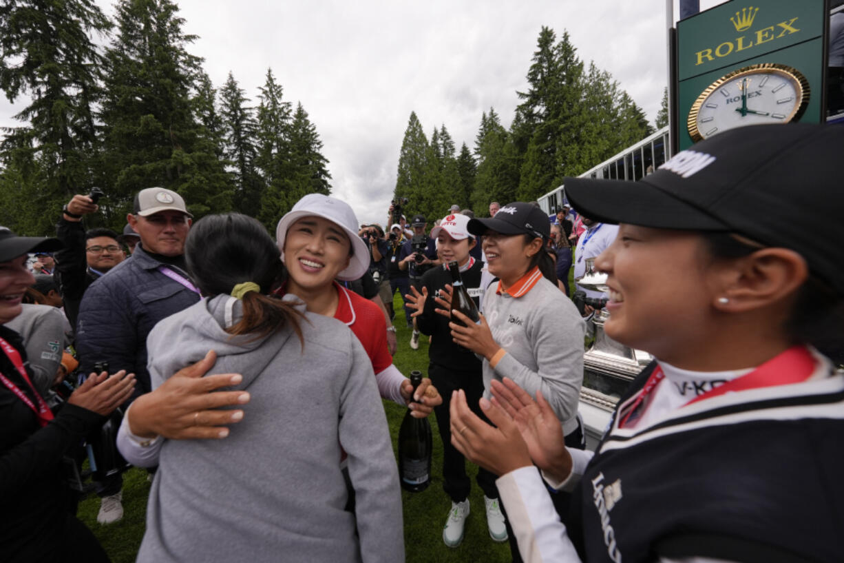 Amy Yang, of South Korea, is congratulated after winning the Women&#039;s PGA Championship golf tournament at Sahalee Country Club, Sunday, June 23, 2024, in Sammamish, Wash.