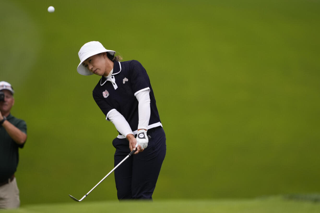 Amy Yang, of South Korea, hits on to the 16th green during the third round of the Women's PGA Championship golf tournament at Sahalee Country Club, Saturday, June 22, 2024, in Sammamish, Wash.