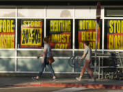 FILE - Shoppers enter exit a Bed Bath &amp; Beyond store Monday, May 29, 2023, in Glendale, Colo. The big-box chain is staging store closing sales at its 360 locations after filing for bankruptcy in late April 2023. An Associated Press analysis found the number of publicly-traded &ldquo;zombie&rdquo; companies &mdash; those so laden with debt they&rsquo;re struggling to pay even the interest on their loans &mdash; has soared to nearly 7,000 around the world, including 2,000 in the United States.