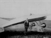 Local pilot and inventor Marvin Joy stands next to his experimental wingless plane that he called the &ldquo;pumpkin seed.&rdquo; The plane was flown twice at Pearson Field, in perhaps the first test of a lifting body aircraft.