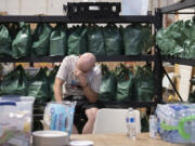 Phillip Dick, who has been a volunteer at Living Hope Church for four years, takes a moment to rest while helping those in need escape the heat wave at the church's cooling center in August 2023. The church is again among the sites offering those in need a respite from the excessive heat forecast for the Fourth of July weekend.