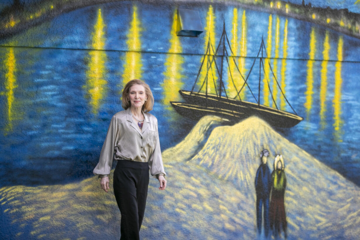 Nancy Nemhauser stands outside of her home, which is painted like van Gogh&rsquo;s &ldquo;Starry Night,&rdquo; on June 27 in Mount Dora, Fla.