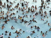 Swimmers try to stay cool in near 100 degree temperatures at Red Oaks Waterpark in Madison Heights, Mich. The Centers for Disease Control and Prevention says drowning is the leading cause of death for children ages 1 to 4. It&rsquo;s also the second leading cause of unintentional death for those ages 5 to 14.