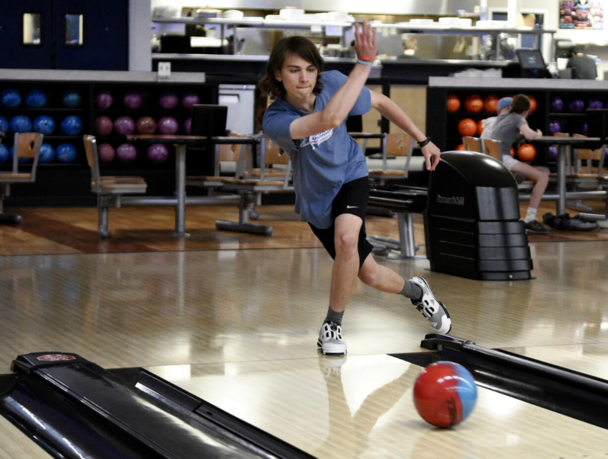 Henry Hind practices at Kingpins bowling center in Portland. Hind, a 16 year old from Camas, is one of the Northwest&#039;s top junior bowlers.