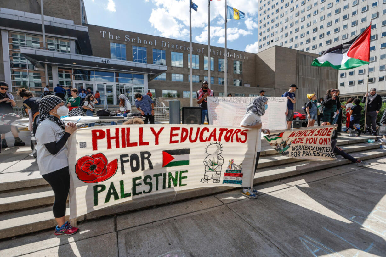 The Philly Educators for Palestine, pictured outside Philadelphia School District headquarters during a May protest, say they support the efforts by National Education Association teachers to adopt a series of action items at this week&rsquo;s meeting. Philadelphia teachers are not part of the NEA. (Steven M.