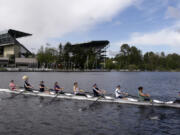 An eight-person rowing team practices on Lake Washington before the Windermere Cup in Seattle. Former University of Washington rowers will be competing for several nations at the Paris Olympics, including the United States, Great Britian, Italy, Germany and New Zealand.