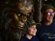 Joseph Lacy, 10, of Arvada, left, and his mother Cindy visits the Sasquatch Outpost on June 26 in Bailey, Colo.