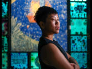 South Florida artist Vu Ho&Dagger;&dagger;ng Kh&Dagger;&ordm;nh Nguy&Dagger;&trade;n, who goes by Vu and uses they/them pronouns, is photographed in the installation by famed artist Edouard Duval-Carri&Dagger;&copy; entitled &ldquo;The Indigo Room or Is Memory Water Soluble.&rdquo;  The installation incorporates Vodou&rsquo;s theatrical sacred personages as players in Edouard&rsquo;s visual dramas of upheaval and transcendence, Haiti&rsquo;s unique history of independence from colonial slavery at NSU Art Museum Fort Lauderdale on Tuesday, June 18, 2024.