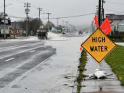 High water is seen on U.S. 101 in Tillamook in December 2023. Tillamook is among dozens of sites along the Oregon Coast where rising sea levels will cause repeat flooding by the end of the century, according to scientists.