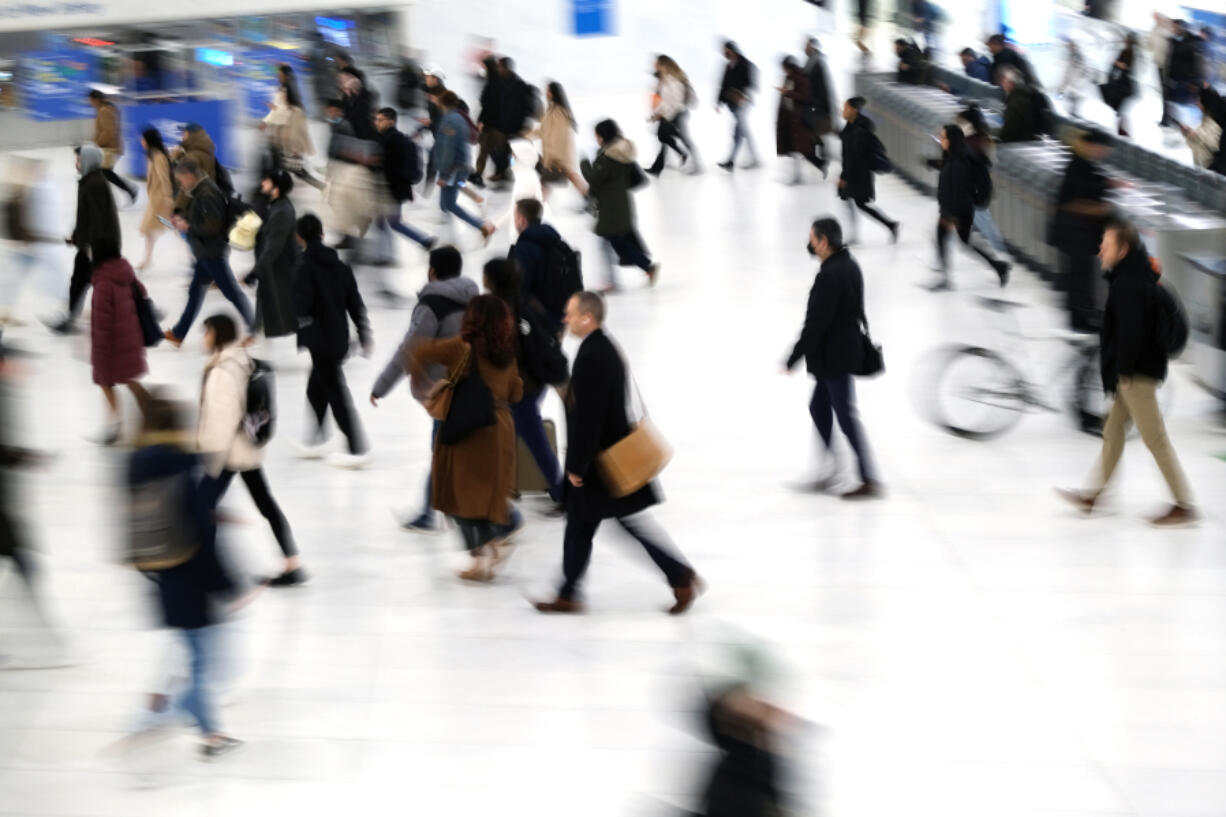 Commuters arrive into the Oculus station and mall in Manhattan in November in New York City. New York City is among the few cities that has pay transparency laws.