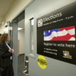 Clark County residents wait outside the elections office to fill out absentee ballots, register to vote or ask election day questions at the Clark County Elections office Tuesday November 6, 2012 in Vancouver, Washington. (The Columbian files)