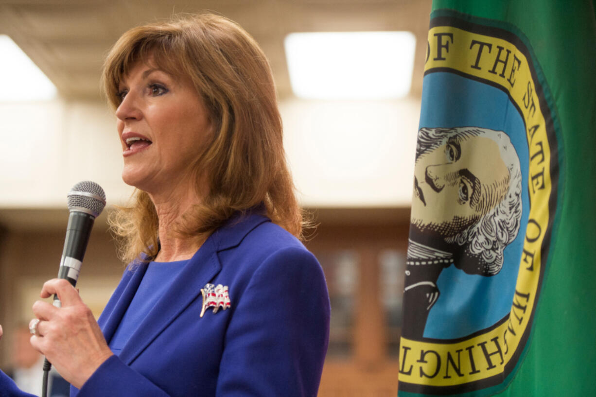 Susan Hutchison, candidate for U.S. Senate, speaks to voters during a rally for her campaign at DeWils Cabinetry in Vancouver on October 30, 2018.