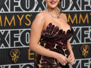 Selena Gomez arrives Jan. 15 at the 75th Primetime Emmy Awards at the Peacock Theater in Los Angeles. (Jay L.