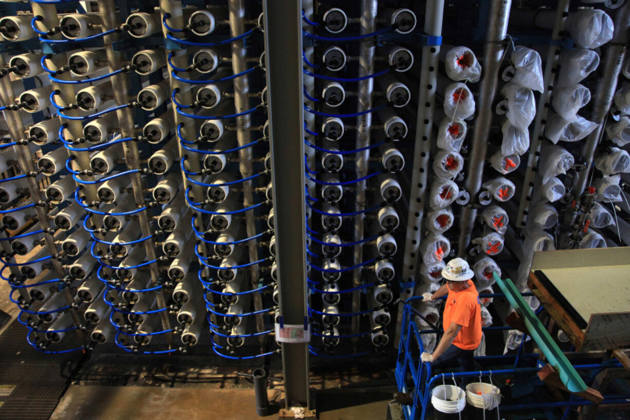 Reverse osmosis membranes are being installed at the Poseidon desalination plant, on Aug. 14, 2015, in Carlsbad, California.