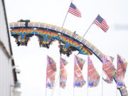 People ride the Ring of Fire ride in 2023 at the Clark County Fair.