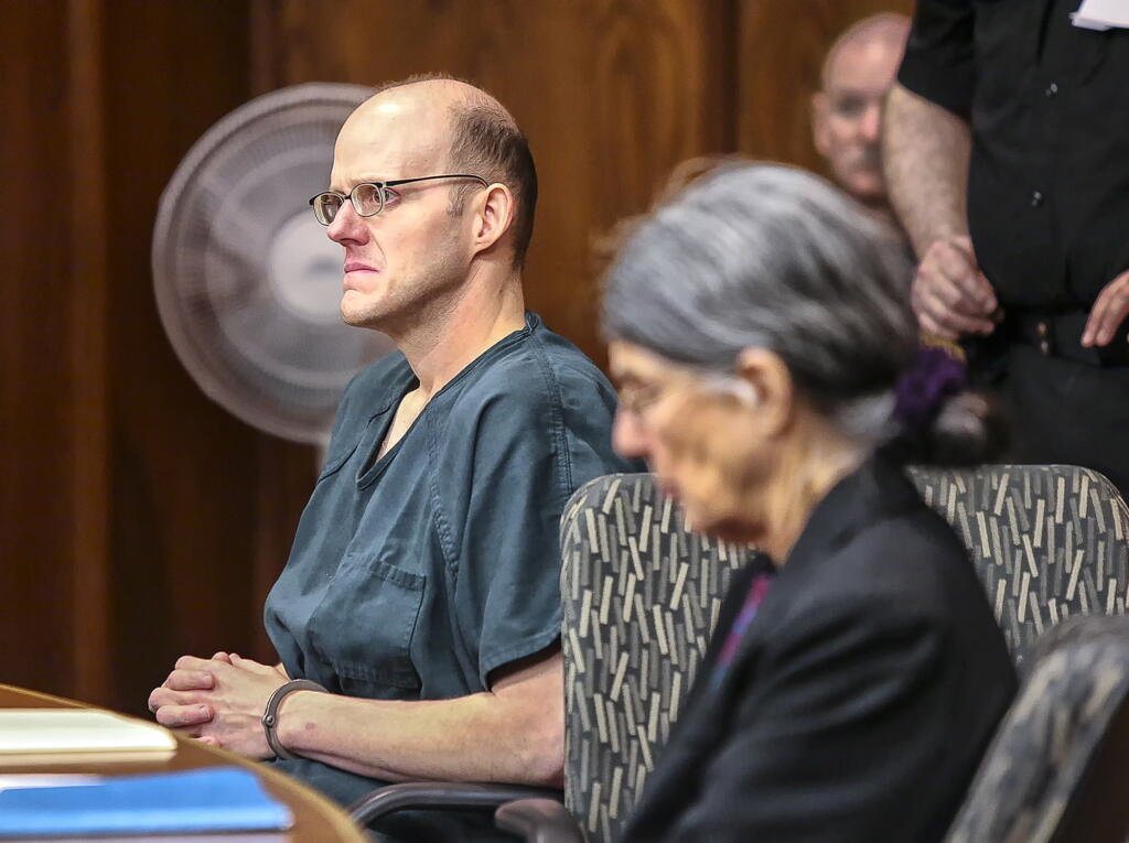 Timothy Haag listens as his attorney gives her opening remarks at the start of his first  resentencing proceedings in Cowlitz County Superior Court in Longview on Jan. 12, 2018.