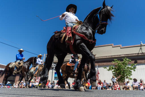 Horseback riders participate in the Fourth of July parade Thursday in Ridgefield.