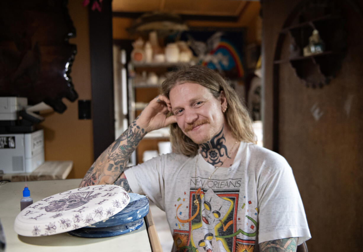 Artist Brad Macom takes a break at his Vancouver home studio. His ceramic vessels adorned with tattoo-inspired art were showcased in a solo exhibit in West Hollywood, Calif., earlier this year.