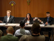 Candidates for 49th Legislative District House Position 2 Russell Barber, from left, incumbent Monica Jurado Stonier and Justin Forsman answer questions Tuesday during a Clark County League of Women Voters forum at the Vancouver Community Library.